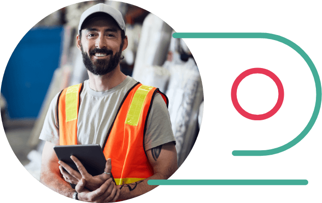 Man holding iPad in Warehouse